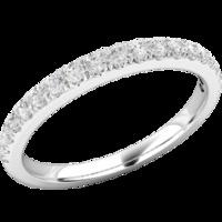 A classic Round Brilliant Cut diamond set wedding/eternity ring in palladium