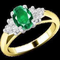 A timeless emerald & diamond ring with shoulder stones in 18ct yellow & white gold