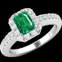 A luxurious Emerald Cut diamond ring with shoulder stones in 18ct white gold