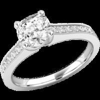 A beautiful Cushion Cut diamond ring with shoulder stones in 18ct white gold