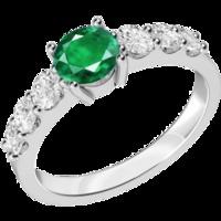 A stunning emerald ring with diamond shoulder stones in 18ct white gold