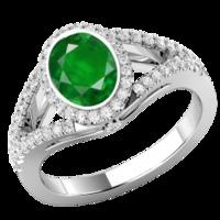 A stunning Emerald & diamond cluster style ring with shoulder stones in 18ct white gold