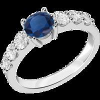 a stunning sapphire ring with diamond shoulder stones in 18ct white go ...