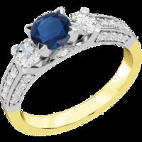 A luxurious sapphire & diamond ring with shoulder stones in 18ct yellow & white gold