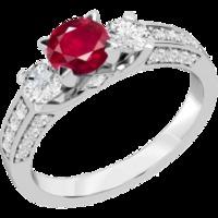 A luxurious ruby & diamond ring with shoulder stones in 18ct white gold