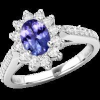 a classic tanzanite diamond cluster style ring in 18ct white gold