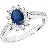 a classic sapphire diamond cluster style ring in 18ct white gold