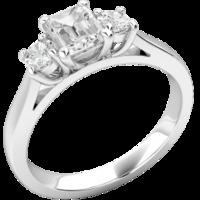 A magnificent Emerald Cut & Round Brilliant Cut three stone diamond ring in 18ct white gold