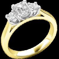 A magnificent Emerald Cut & Round Brilliant Cut three stone diamond ring in 18ct yellow & white gold