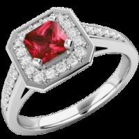 A stunning ruby and diamond cluster with shoulder stones in platinum