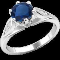 A stunning Round Cut Sapphire and Diamond ring with shoulder stones in 18ct white gold