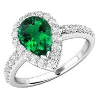 A stunning Pear Shaped Emerald and diamond cluster ring with shoulder stones in 18ct white gold