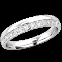A stylish offset ladies diamond set wedding/eternity ring in platinum