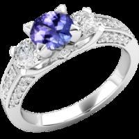 A luxurious tanzanite & diamond ring with shoulder stones in 18ct white gold