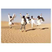 Abu Dhabi Evening Desert Safari With Belly Dance BBQ Dinner Camel Ride Sand Boarding and Dune Bashing