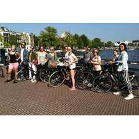 amsterdam bike rental with cup of coffee