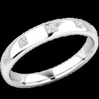 An elegant diamond set courted ladies wedding ring in palladium (In stock)