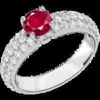 an elegant ruby ring with diamond shoulder stones in 18ct white gold