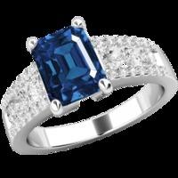 An elegant Emerald & Round Brilliant Cut sapphire & diamond ring in platinum