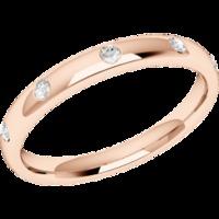 An elegant diamond set courted ladies wedding ring in 18ct rose gold