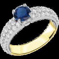 An elegant sapphire ring with diamond shoulder stones in 18ct yellow & white gold