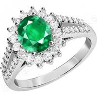 an elegant emerald diamond cluster style ring in 18ct white gold