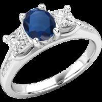 An elegant sapphire & diamond ring with shoulder stones in 18ct white gold