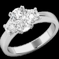 An exquisite oval and trapezium cut diamond ring in platinum