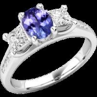 An elegant tanzanite & diamond ring with shoulder stones in 18ct white gold