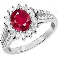 An elegant ruby & diamond cluster style ring in 18ct white gold