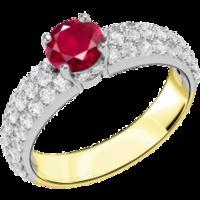 An elegant ruby ring with diamond shoulder stones in 18ct yellow & white gold