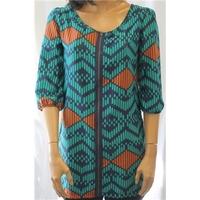 apricot small turquoise and orange patterned tunic top