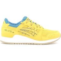 Asics H6X1N Sport shoes Unisex Yellow women\'s Shoes (Trainers) in yellow