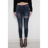 asymmetric ripped skinny jeans in dark blue