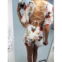 Astella floral printed open back playsuit