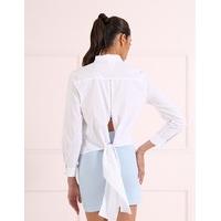 bailey white blouse features an open back with tie detail