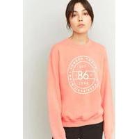 bdg 86 graphic print peach sweatshirt orange