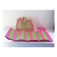 beach bag mat and flip flops in pink green