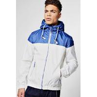 blue shower resistant colour blocked hooded cagoule royal