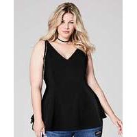 black textured sleeveless peplum top