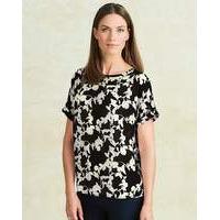 black floral drop sleeve shell top