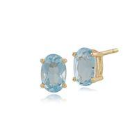 blue topaz oval stud earrings in 9ct yellow gold 6x4mm claw set