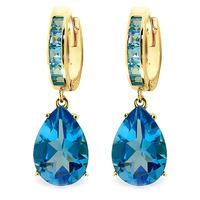 blue topaz droplet huggie earrings 132ctw in 9ct gold