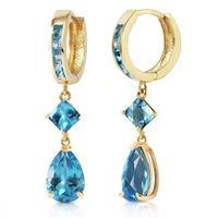 blue topaz droplet huggie earrings 562ctw in 9ct gold