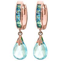 blue topaz droplet huggie earrings 685ctw in 9ct rose gold