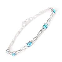 Blue Topaz and Diamond Evert Tennis Bracelet 1.15ctw in 9ct White Gold