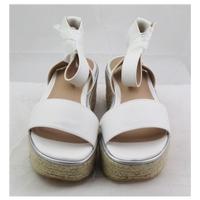 BNWT Limited Edition, size 3 white platform sandals