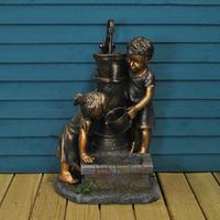 Boy, Girl & Water Pump Outdoor Water Feature (Mains) by Kingfisher