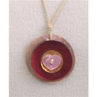 brown cord necklace round shell pendant