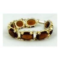 Brown coloured stones linked bracelet